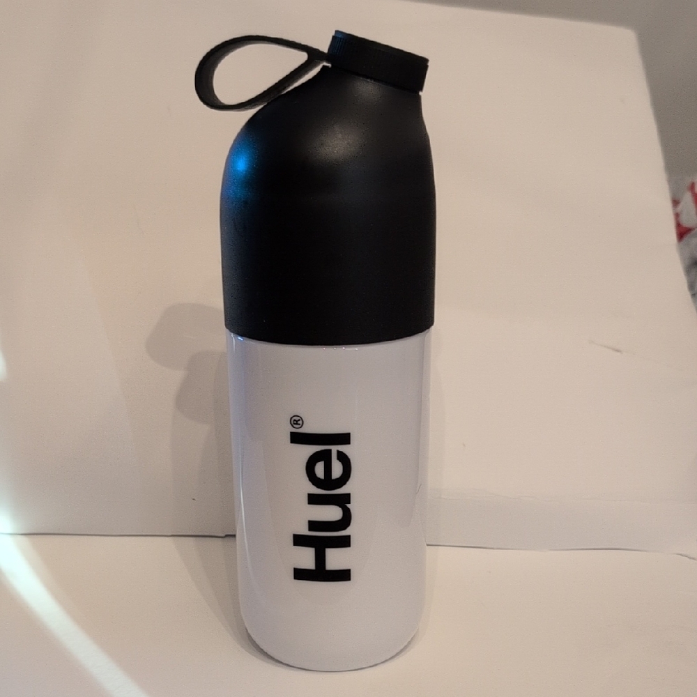 Black and White Huel Blender Bottle W/ Strap Lid And Insert